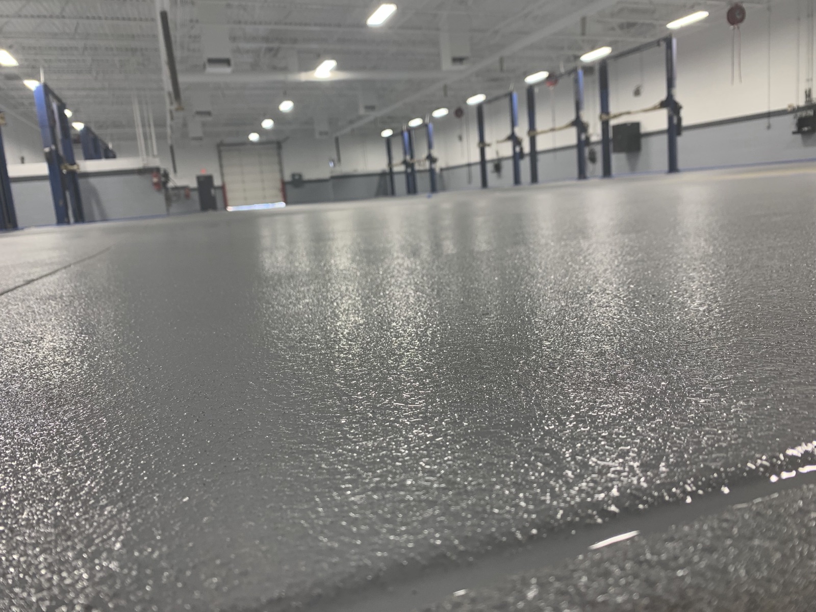 Close-up of a slip-textured commercial epoxy floor finish